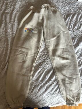 White Fox Boutique Cream Track Pants with Colorful Logo